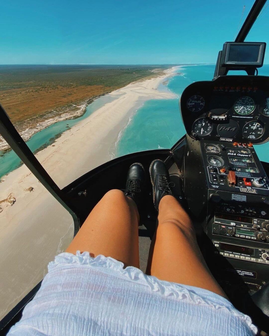 Ashleigh Vader Girl enjoying beach view Kas helicopters Broome Western Australia chopper ride