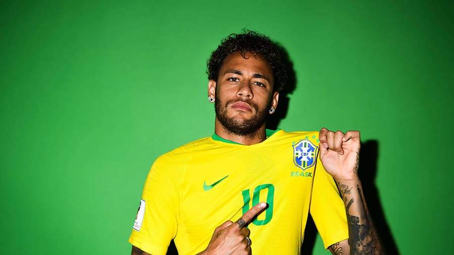 Neymar Jr wallpaper HD photo Brazil shirt 900 x 506 pixels laptop pointing emblem